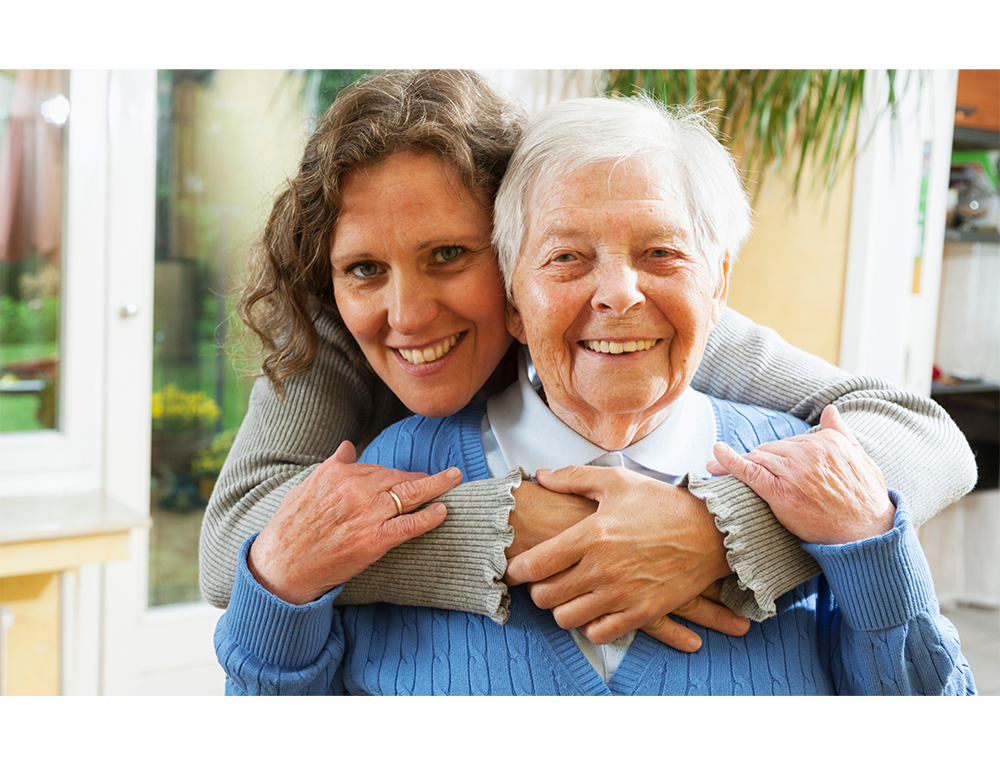 Caregiver Hugging Patient